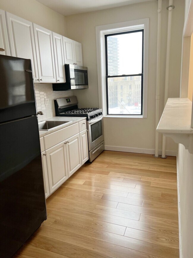 Foto del edificio - 6114 Highland Pl