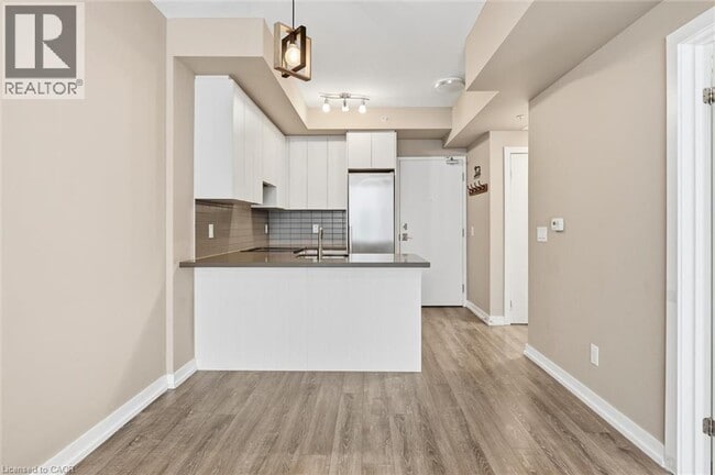 Building Photo - 457 Plains Rd E