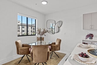 2BR, 2BA - 890SF - Dining Room - Flamingo Village