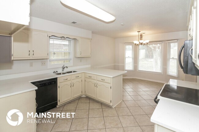 Foto del edificio - 8925 Walnut Forest Cove