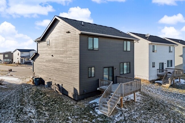 Building Photo - Spacious 4-Bedroom Home with 2-Car Garage & Yard