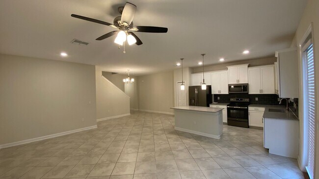 Building Photo - 3 Bedroom, 2.5 Bath Townhome in Lake Nona - Priced to Rent!