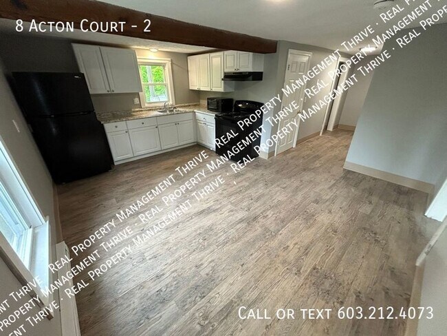 Building Photo - Updated 2nd Floor 2 BR, 1 BA...First Month...