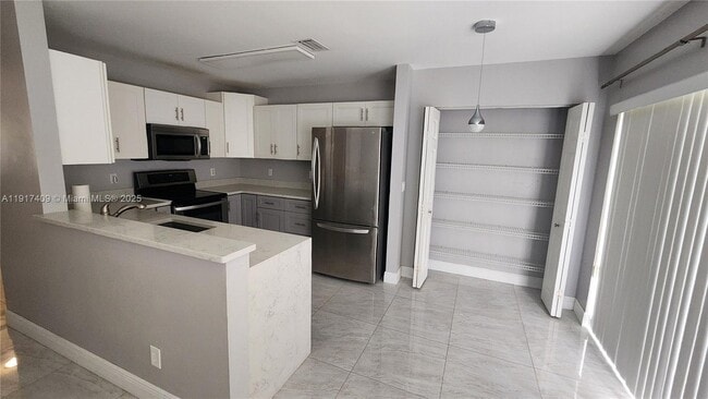 Foto del edificio - 20886 NW 2nd St