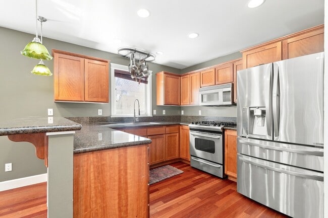 Building Photo - *Beautiful Ballard Townhome with Spacious Fenced Yard & Attached Garage FOR RENT* Available for M...
