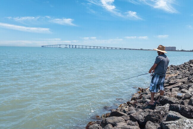 A fisherman at the San Francisco Bay Trail