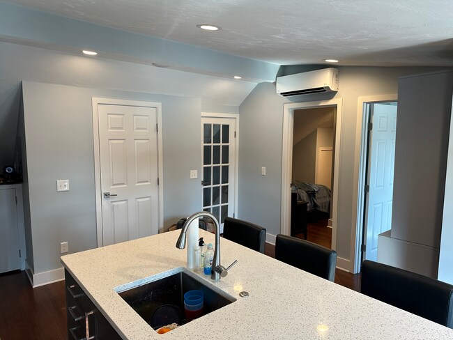 From left to right (Bathroom, Entrance door, Bedroom 1, Bedroom 2) - 1193 Cranston St