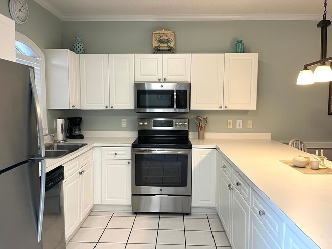 Building Photo - Magnolia North Furnished Two Bedroom Condo is Available Now! Overlooks the Myrtlewood Golf Course!