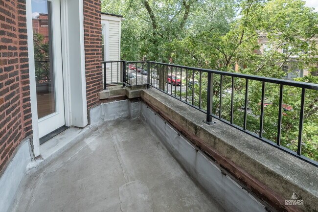 Building Photo - Modern 4BR Apartment with Hardwood Floors, Balcony & Central A/C