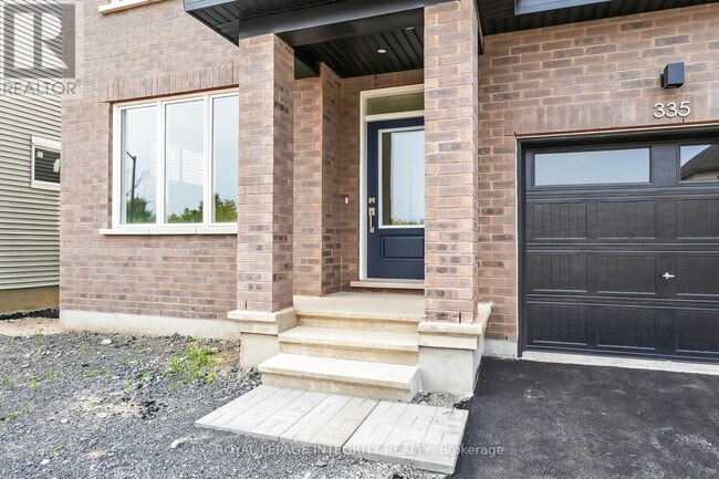 Building Photo - 335 Les Emmerson Dr