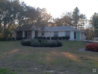 Building Photo - 5070 N Sandalwood Dr