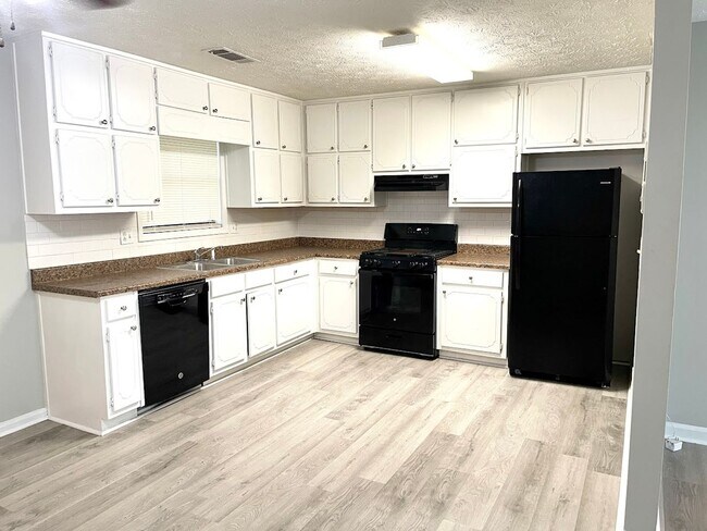 Building Photo - Welcome to Splendid Surfaces! Located in t...