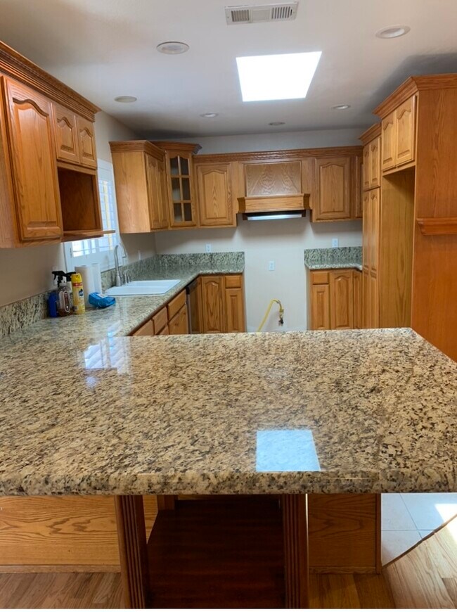 Kitchen with built in dining table counterheight - 1762 W 245th St