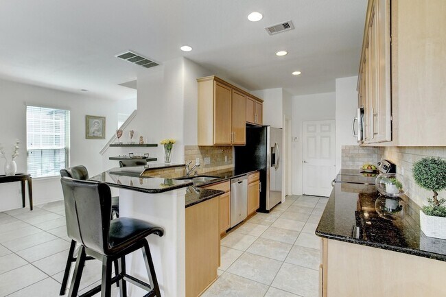 Foto del edificio - 6423 Calgary Woods Ln