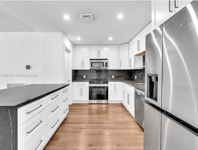 Building Photo - Taft Street, Hollywood, FL 33021 - 4 BR 2 BA single-family home