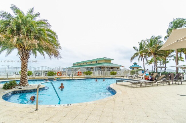 Building Photo - 16699 Collins Ave