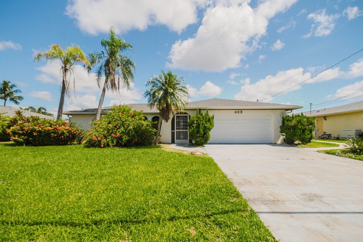 Photo - 403 SE 33rd Terr, Cape ~ Charming 3 bedroom Pool Home on Canal ~ FULLY FURNISHED - ANNUAL RENTAL ~ F