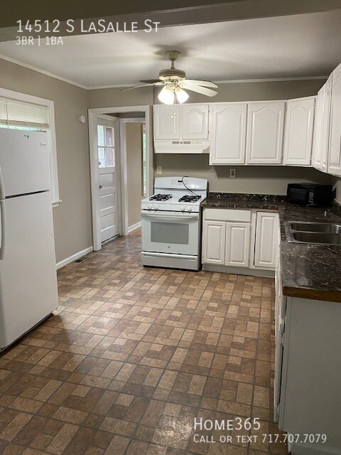 Foto del edificio - Cozy 3-Bedroom Home with Basement for Rent...