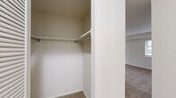 Located at 600 Old Street Rd in Feasterville, PA, this single-floor residence offers three bedrooms, one bathroom, and a thoughtfully laid-out floor plan. The living area is generously proportioned, featuring soft neutral carpeting, a ceiling fan with light fixture, and a sliding glass door that floods the space with natural light and provides access to an outdoor balcony. An additional window further brightens the room, creating an open and airy atmosphere.

The kitchen is well-equipped with warm wood cabinetry lining both walls, dark granite-style countertops, a gas range, a Whirlpool refrigerator, and a stainless steel sink. Light tile flooring and a window overlooking greenery complete the functional and efficient workspace.

The expansive primary bedroom offers an impressive amount of floor space, enhanced by natural light from a large window with blinds. It features an abundance of storage with two sets of bifold closet doors spanning nearly the full width of one wall. The additional bedrooms are comfortably sized with carpeted floors and natural light. The bathroom is clean and straightforward, featuring a tiled tub-shower surround, a vanity with storage, and a mirrored medicine cabinet.