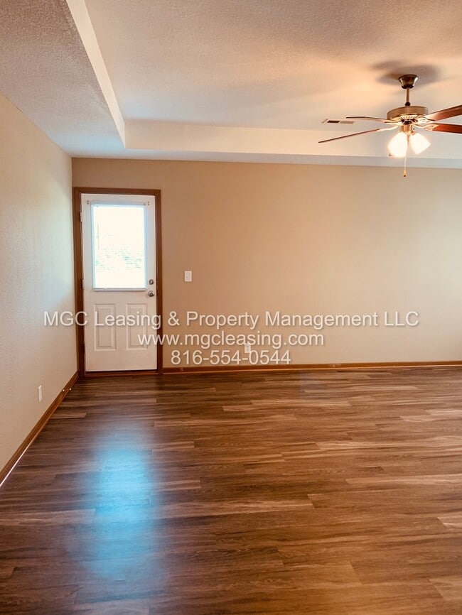 Building Photo - Charming Brick Ranch Duplex in the Heart of Lone Jack - Ready Now