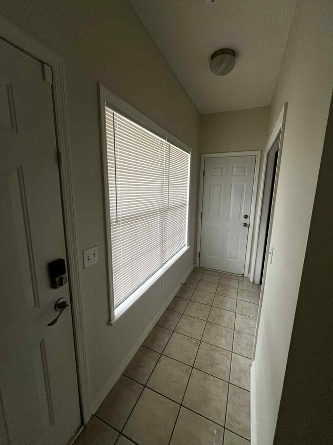 Hallway to laundry room and garage - 79 Courtyard Way
