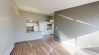 This 560 square foot, single-floor apartment in Columbus, Ohio, offers a practical and modern living space. The layout efficiently utilizes the available area, comprising one bedroom, one bathroom, a living room, and a kitchen. The primary bedroom, measuring 160 square feet, provides a cozy retreat.

The kitchen showcases a galley-style design with white cabinetry, granite-look countertops, and essential appliances. Wood-look flooring in the kitchen and living areas adds warmth and durability. The living room features a ceiling fan and large windows, allowing natural light to flood the space and create an open atmosphere.

The bathroom is well-appointed with a shower/tub combination, white fixtures, and additional storage. The bedroom offers carpeting for comfort and a window for natural light. Throughout the apartment, neutral wall colors provide a blank canvas for personalization.

Key features include ample storage solutions, a mix of carpeting and hard flooring, and strategically placed windows for optimal lighting. The property's location at 988 Muirwood Village Dr in Columbus ensures convenient access to local amenities. This compact yet functional apartment is ideal for individuals or couples seeking a modern, low-maintenance living space.