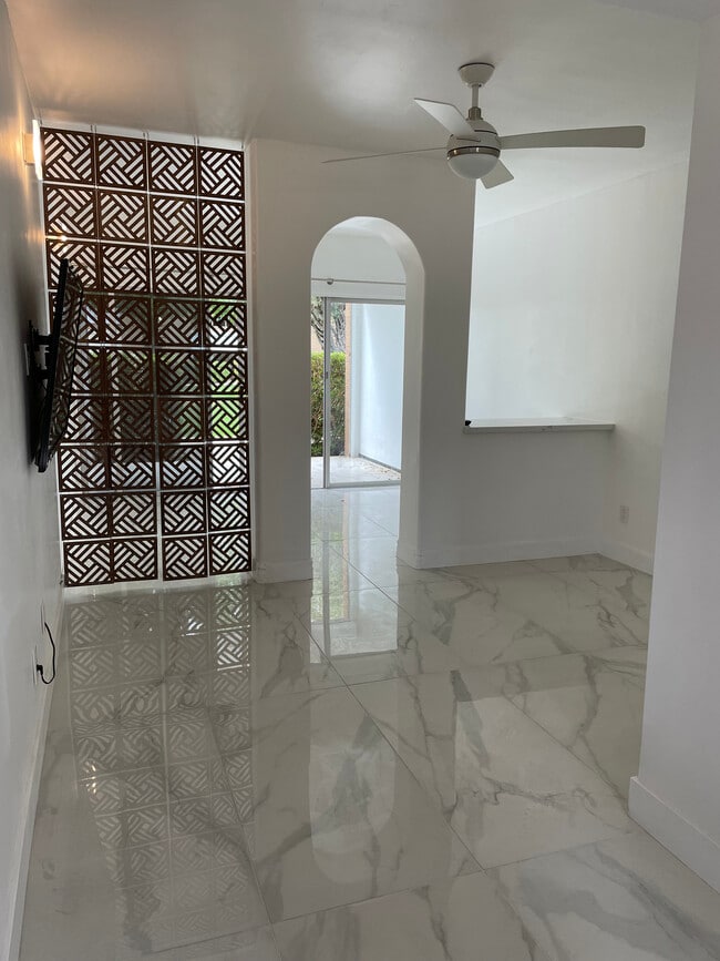 Open floor plan with divided living and sleeping area - 6125 E Indian School Rd Apartment