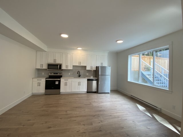 Building Photo - 1343 Langara Dr
