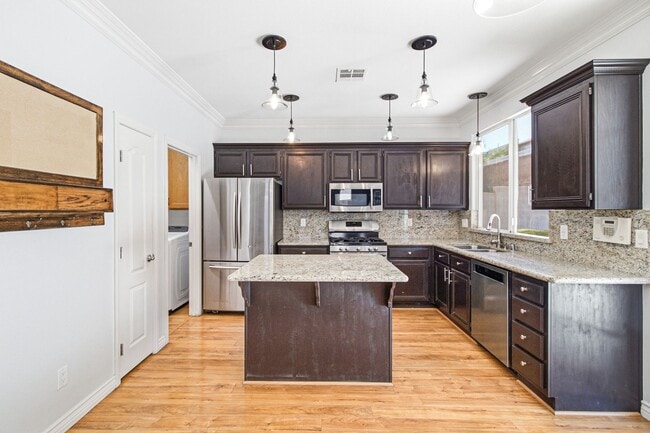 Building Photo - Beautiful 4-Bedroom Home with Pool & Rock Waterfall in 89002