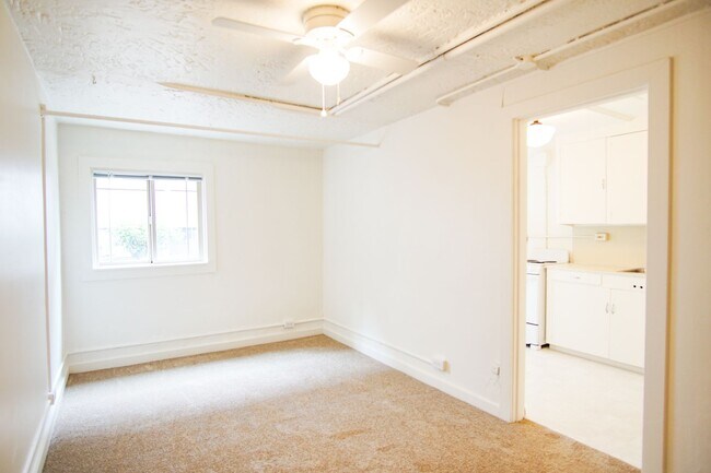 Building Photo - Close-in NE Daylight Basement Studio Ready...