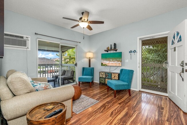 Building Photo - FULLY FURNISHED, 2/1.5 2nd floor condo in Keonekai Villages.