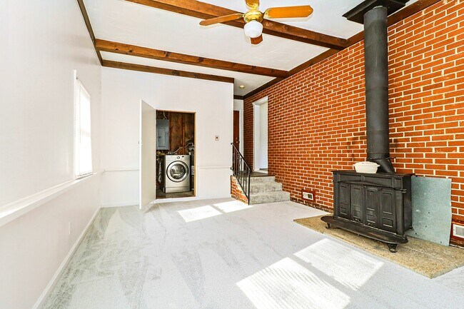 Living Room/Laundry - 301 Dover Rd