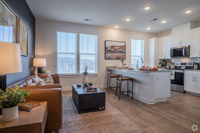 1 dormitorio, 1 baño - 580 pies cuadrados - Mosaico - Sala de estar - Nova River District