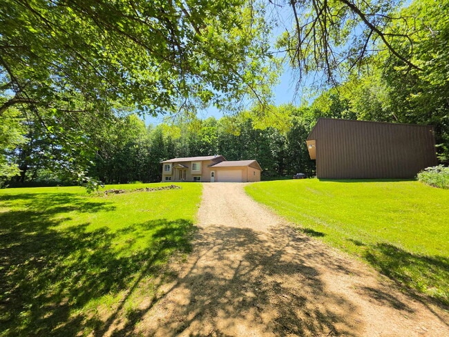 Building Photo - 4 Bedroom 2 Bathroom Home on 5 Acres with Shop, New Deck & Attached Garage