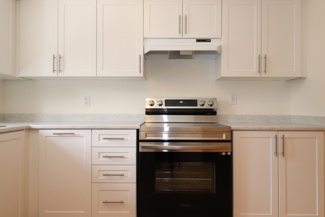 Photo du bâtiment - Spectacular 3-Bedroom Townhouse for Rent i...