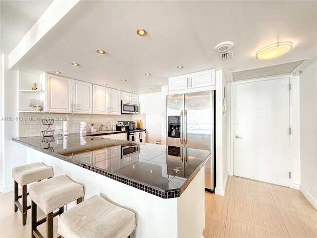 Building Photo - 5701 Collins Ave