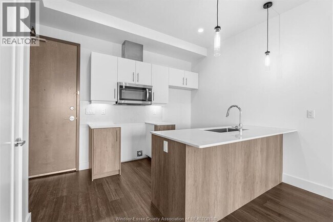 Building Photo - 595 LILYMAC Unit# 206