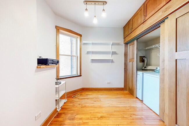 Breakfast nook and laundry closet - 3843 W Addison St