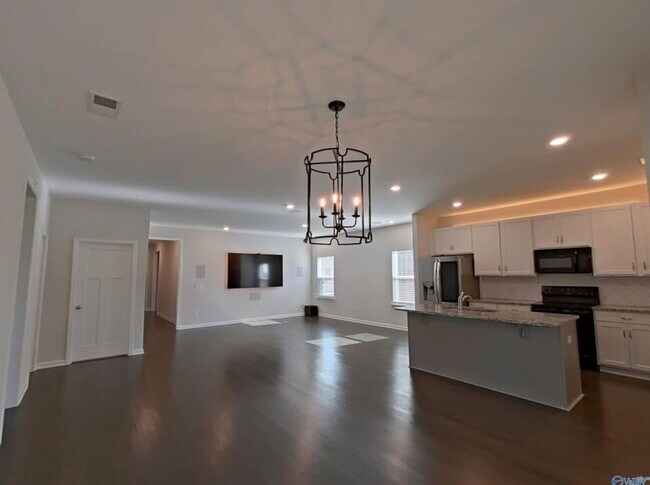 Building Photo - "Charming 3-Bed Oasis with Granite Touches & Hardwood Elegance and loads of high tech upgrades in...