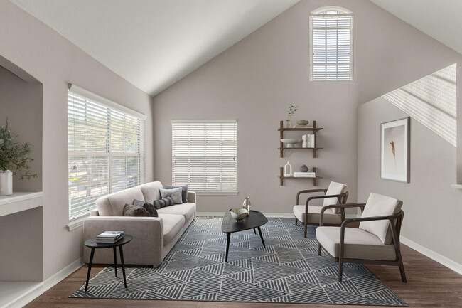 Experience the serene elegance of this spacious living room, designed for modern comfort. - Solace Timacuan