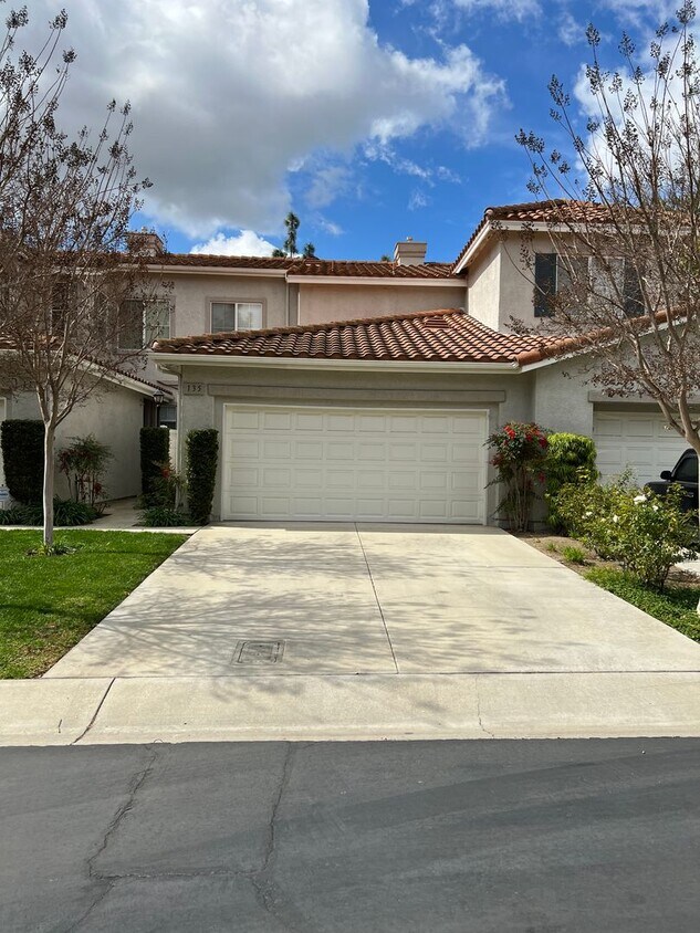 Primary Photo - Los Arboles town-home with a Driveway