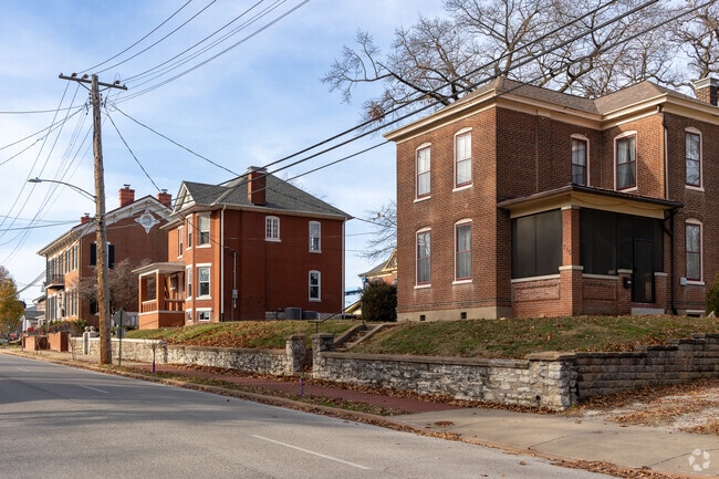 See many rows of two-story brick houses in Belleville, IL
