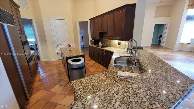 Building Photo - 6 br, 4.5 bath House - 21384 Greenwood Ct