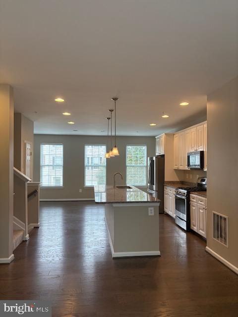 Foto del edificio - 7846 River Rock Way
