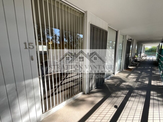 Photo - 6936 E 4th St Apartment