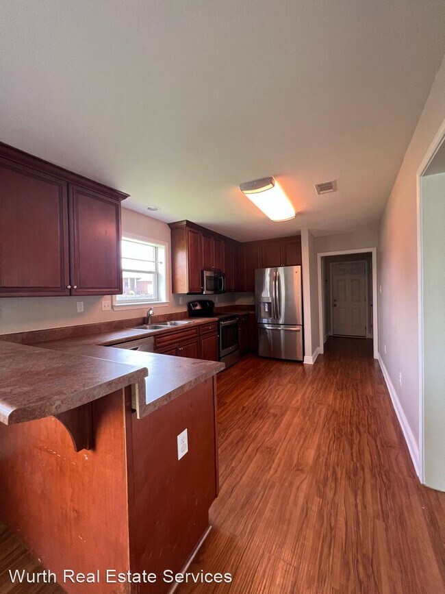Building Photo - 3 br, 2.5 bath House - 5004 Palmetto Cove