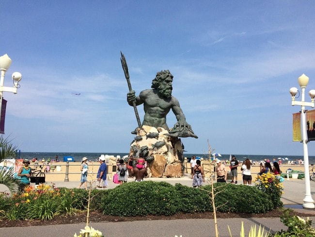 The statue of King Neptune stands 34 feet tall
