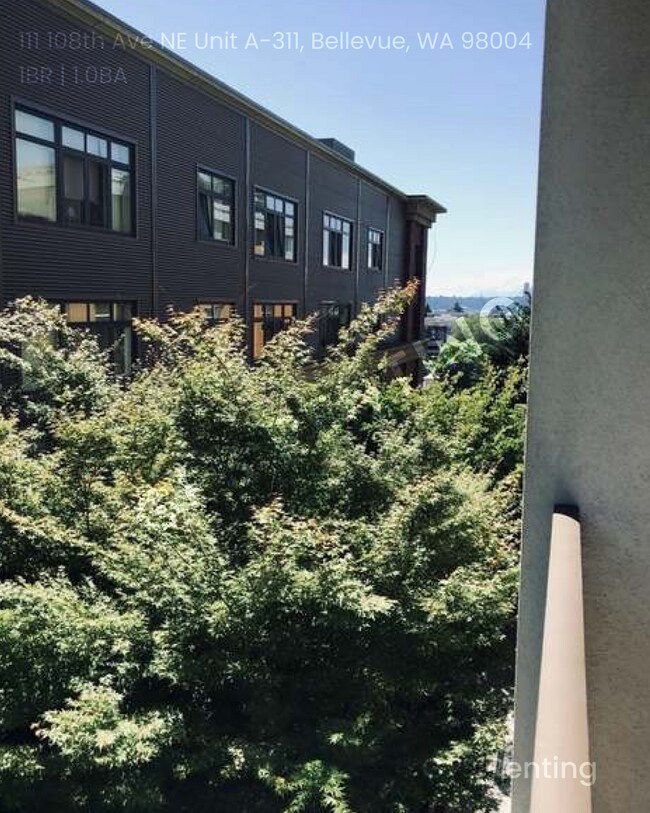 Foto del edificio - Urban Living at Its Finest – 1BR Condo in ...