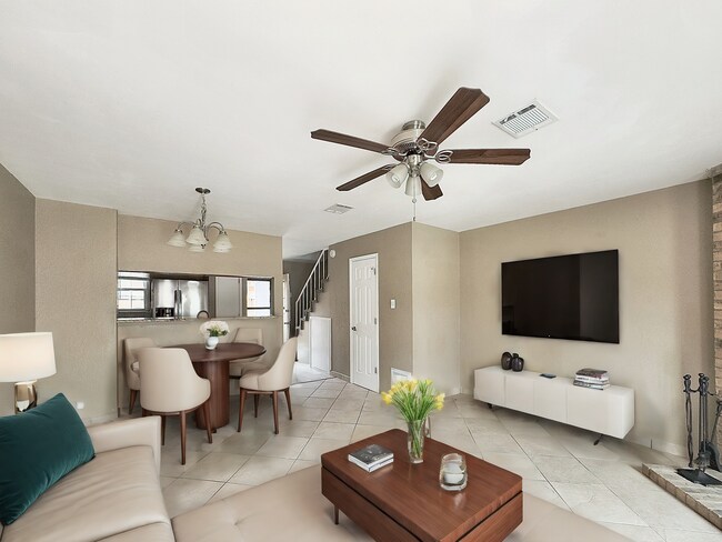 Building Photo - Remodeled Townhome with Community Pool and...