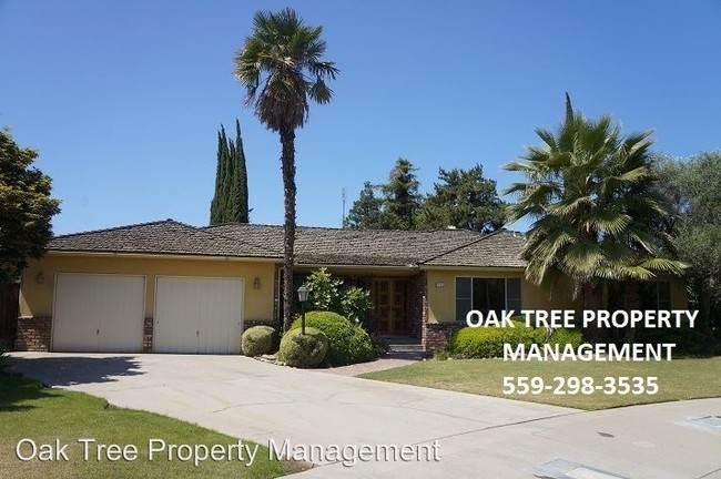 Building Photo - 4 br, 2 bath House - 715 E. Alluvial Ave
